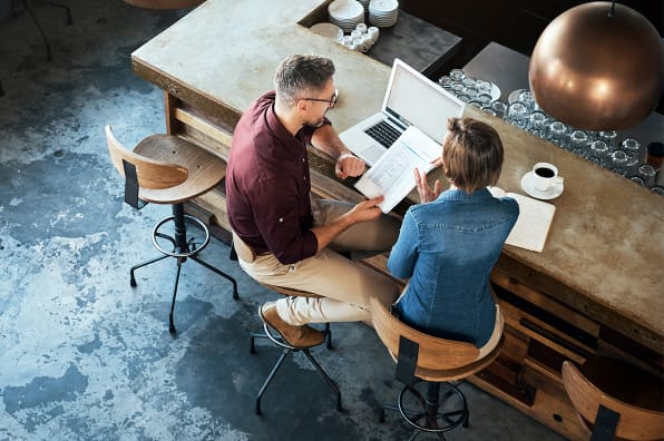 Business owners working in bar